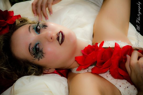 Female model photo shoot of Sine Makeup Artistry