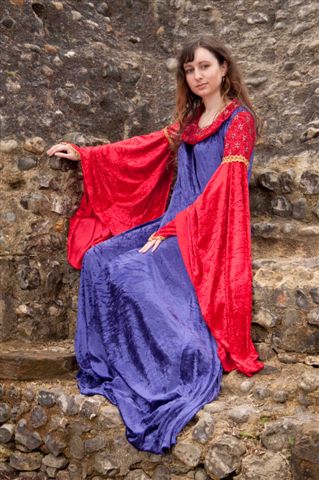 Female model photo shoot of Kate Palmer by Rich from Sussex in Bramber Castle, Steyning, West Sussex, clothing designed by Cotter Industry
