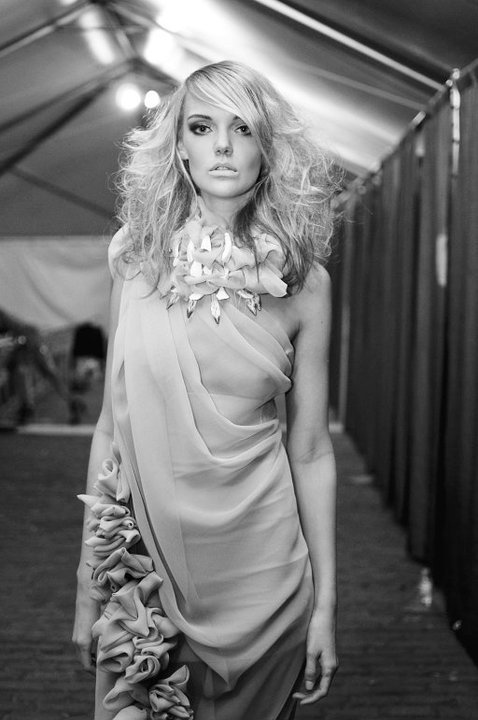 Female model photo shoot of Emily Elizabeth Cash in Charleston Fashion Week 2011