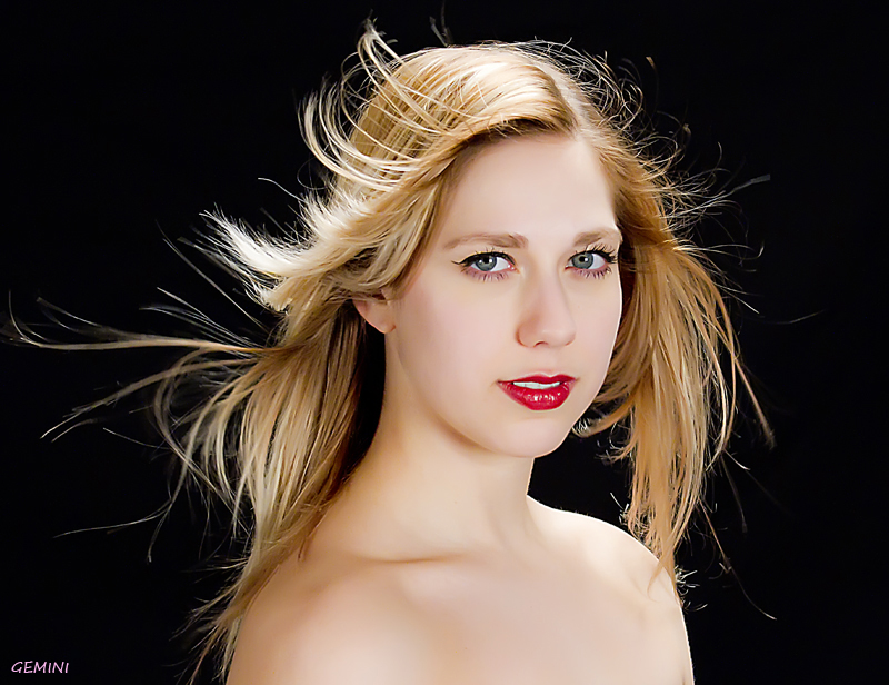 Female model photo shoot of blue eyed blonde in studio