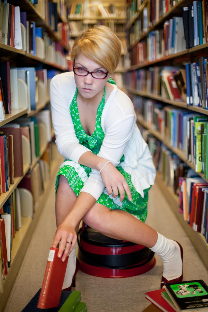 Female model photo shoot of AishaJones in Library