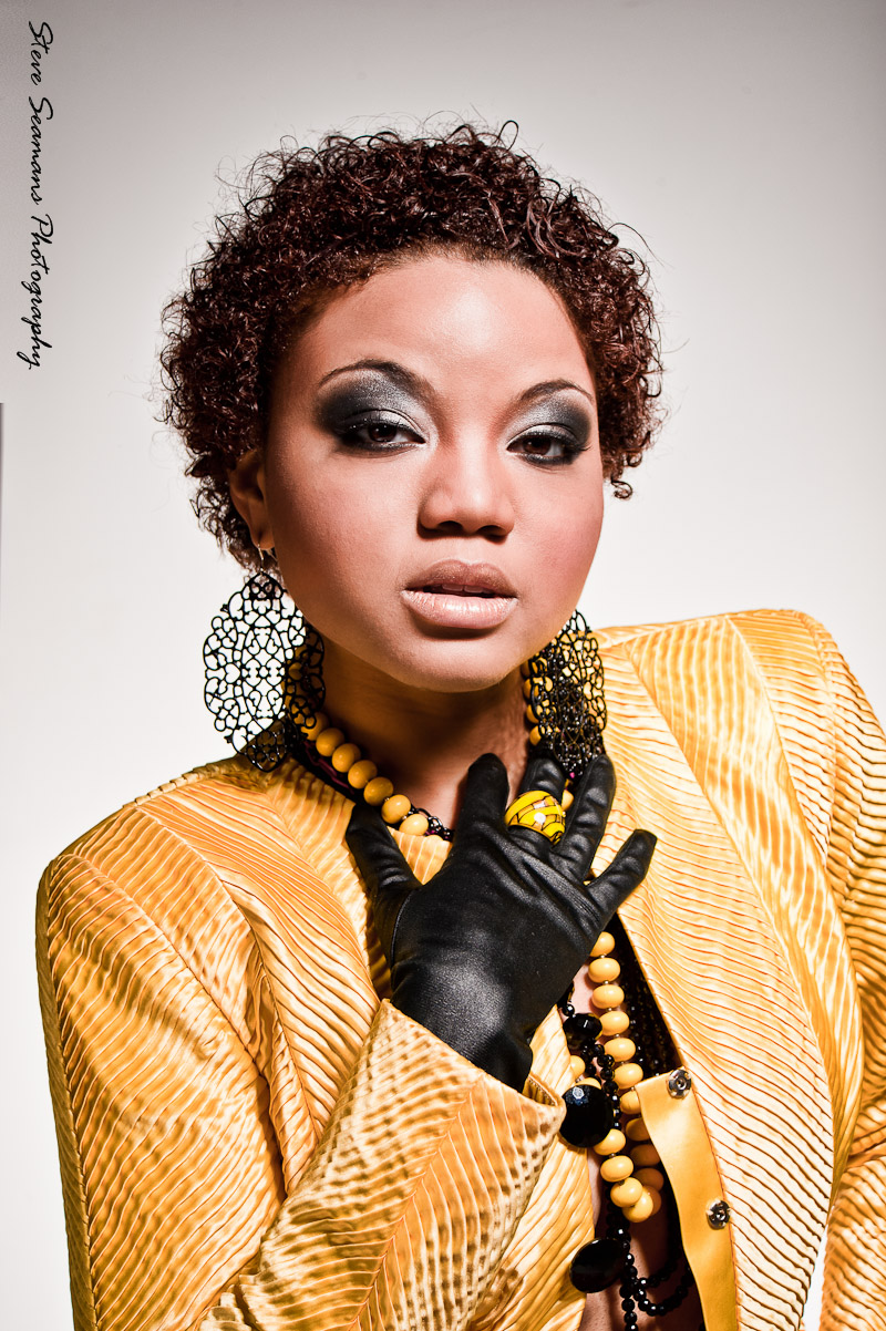 Female model photo shoot of brown vintage and Rogue Fatale by Stephen Lowell, makeup by MnE Creative Production