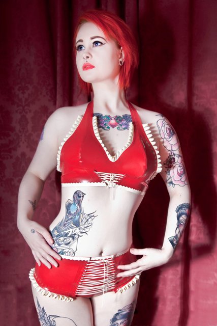 Female model photo shoot of fetasia latex