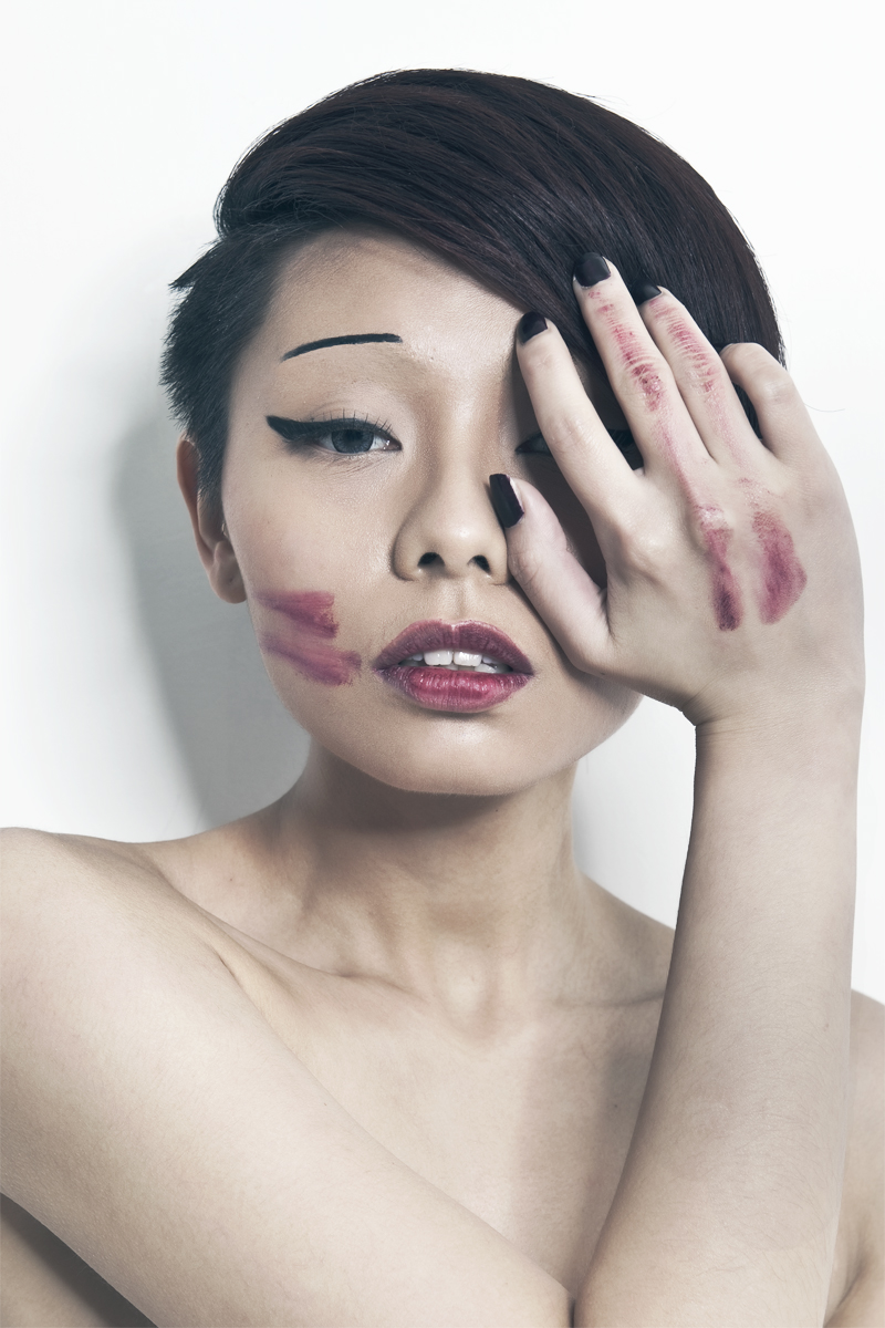 Female model photo shoot of mandylee makeup