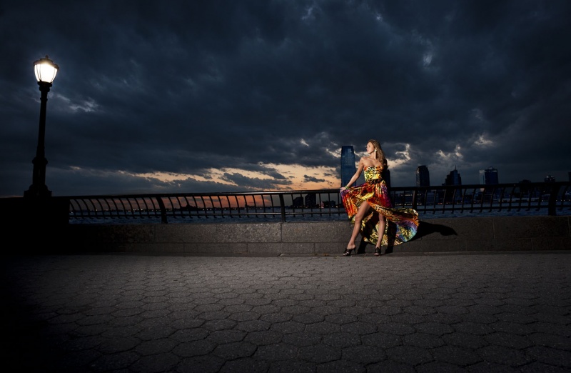 Male and Female model photo shoot of Andre Mastro and Tatiandra in Battery Park, NYC, clothing designed by FARAJ COUTURE