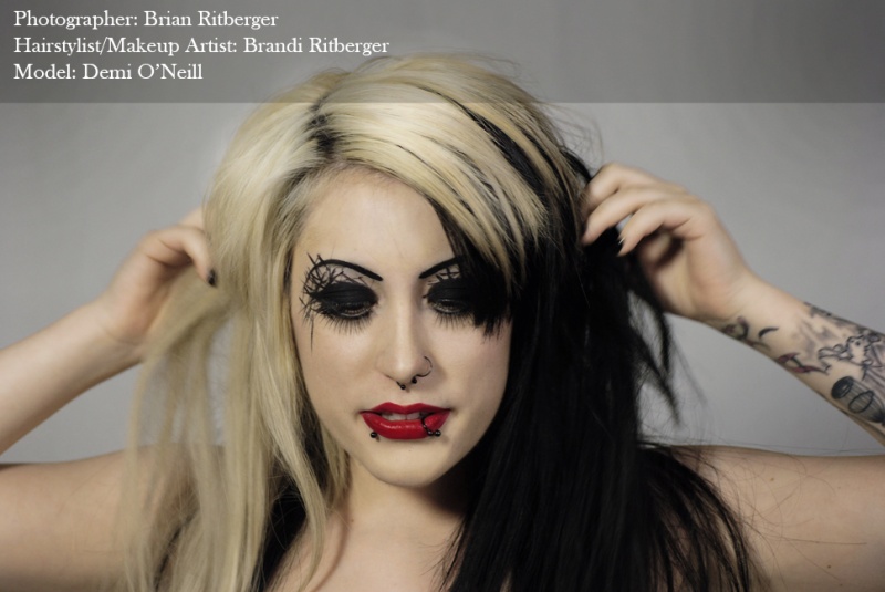 Female model photo shoot of Brandi Hairstylist-MUA