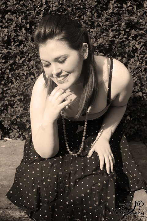 Female model photo shoot of Miss Iced Gem in garden