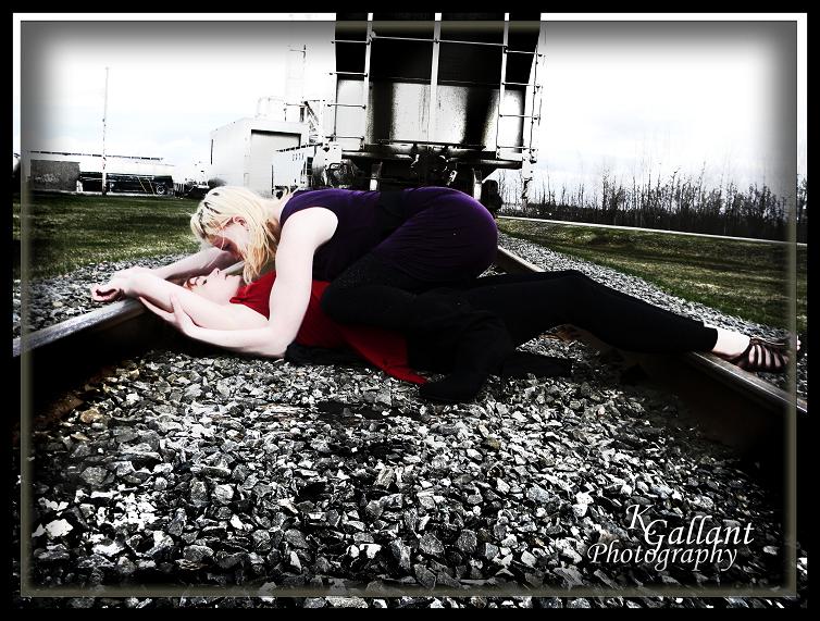 Female model photo shoot of Karee Gallant, LanniTheRed and DyDynamo in railroad tracks
