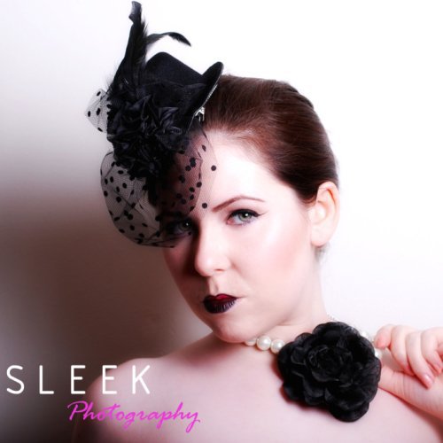 Female model photo shoot of Sleek Photo