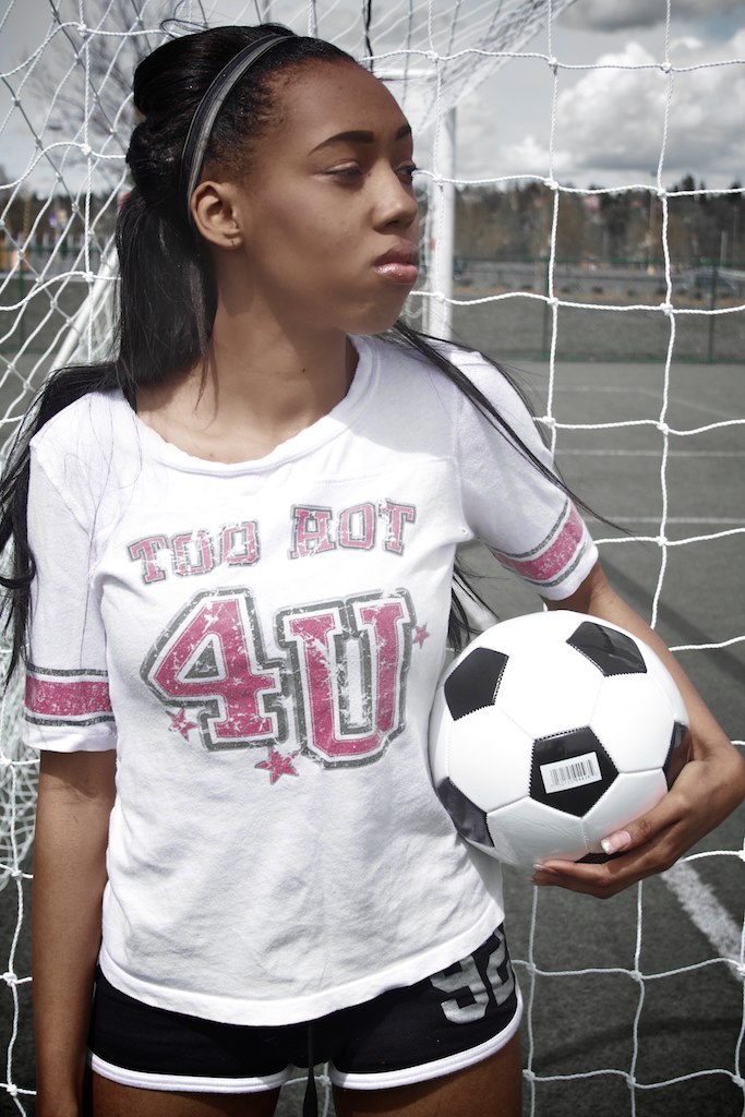 Female model photo shoot of milouze by Ashton Shah in UW soccer field