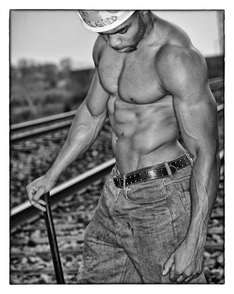 Male model photo shoot of King_Red by Yikmun Photography in train tracks