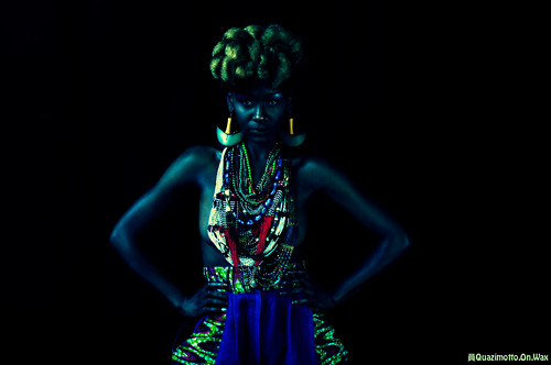 Female model photo shoot of Oluwatoyin Pyne in http://quazimottoonwax.tumblr.com/post/3117783022/afro-psychedelic-model-oluwatoyin-pyne-make-up