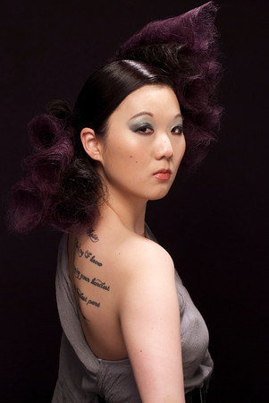 Female model photo shoot of Suki Suke in Aveda Salon