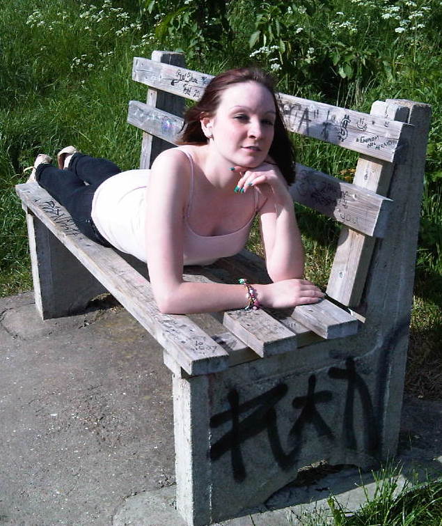 Female model photo shoot of Sarah_C in Graffiti bench, Liquorice Park, Lincoln, Lincolnshire