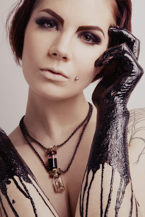 Female model photo shoot of Dorothy Johanna, hair styled by Numi Empire, clothing designed by Gilding Primal Instinct