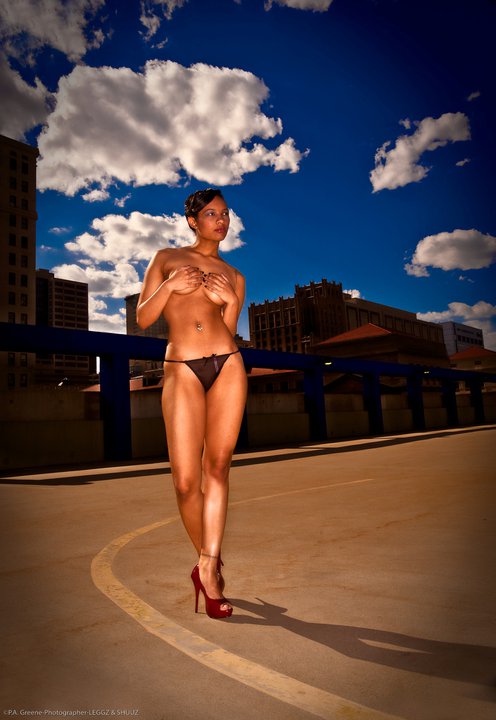 Female model photo shoot of Primp Artists in Secret Garage Rooftop Location