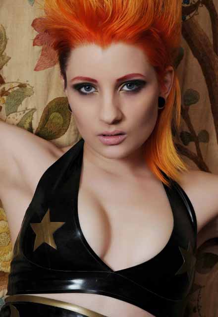 Female model photo shoot of Extacy Photographic and Ulorin Vex, clothing designed by Jane Doe Latex