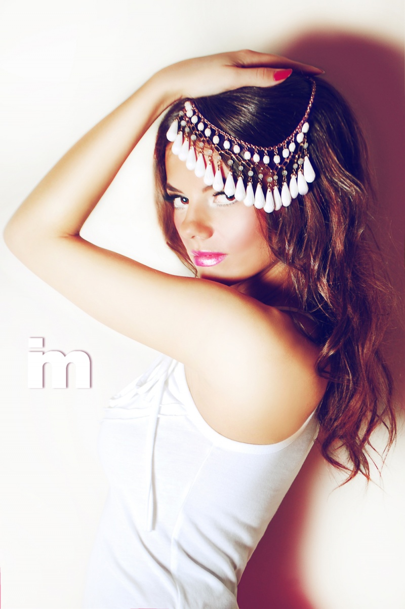 Female model photo shoot of Irida Photography