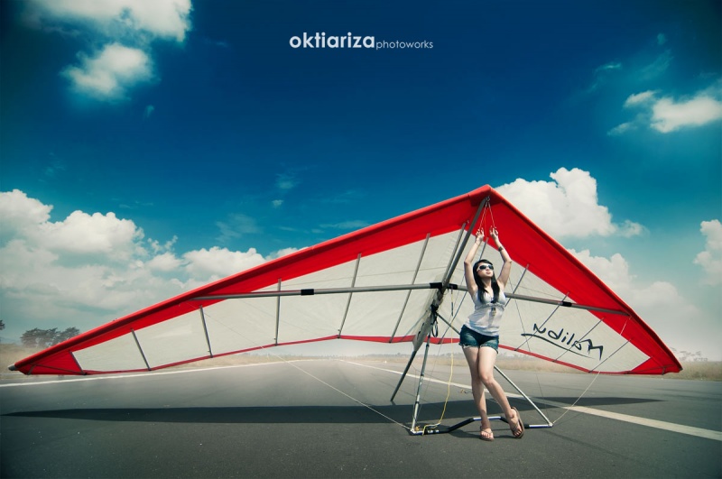 Male model photo shoot of oktiariza in Runway 20, Notoadhinegoro Airport, Jember, East Java, Indonesia