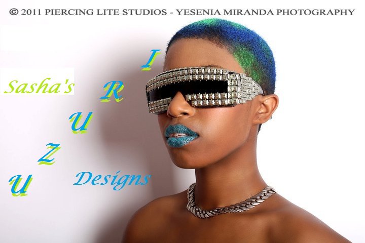 Female model photo shoot of Uzuri Designs