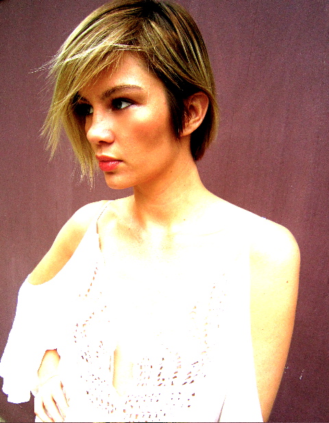 Female model photo shoot of Emmily Banks Makeup 