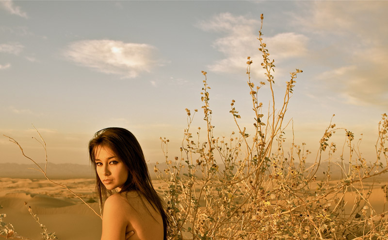 Female model photo shoot of Alanna Scheer in Sand dunes Yuma, AZ
