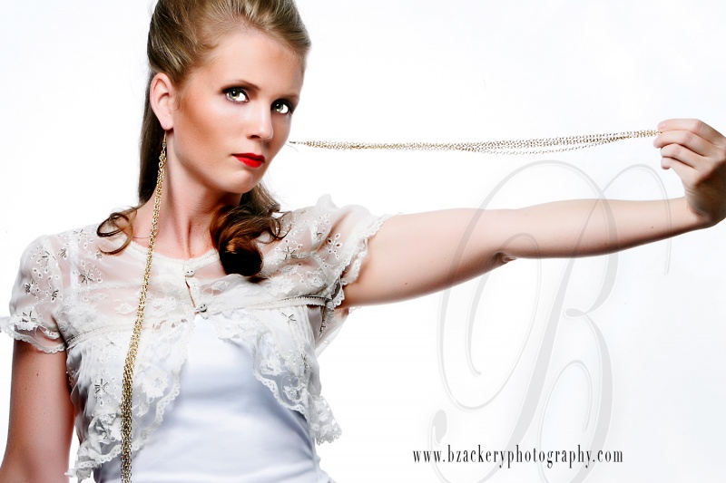 Female model photo shoot of LadyReddsCollection by Brandon Zackery Imagery, hair styled by Kelly Michelle Hair