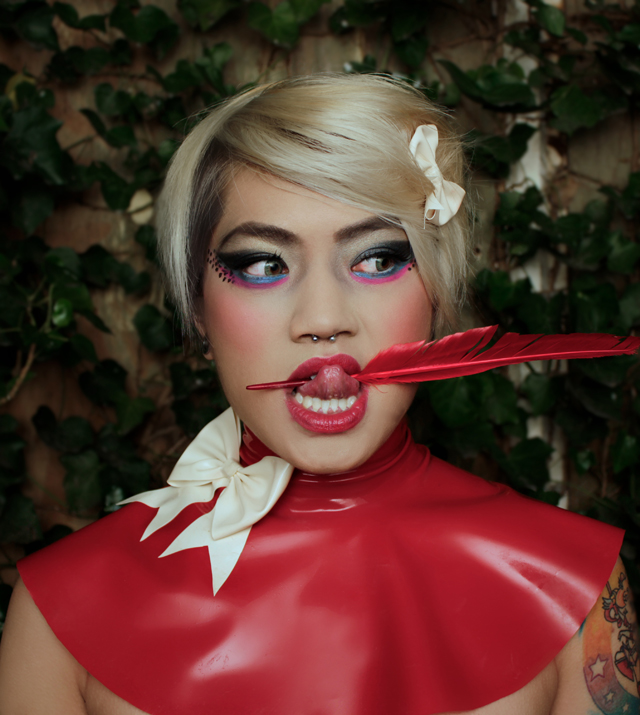Female model photo shoot of KayKay Sakura, makeup by Eeman Cheung, clothing designed by Lady Alluras Latex