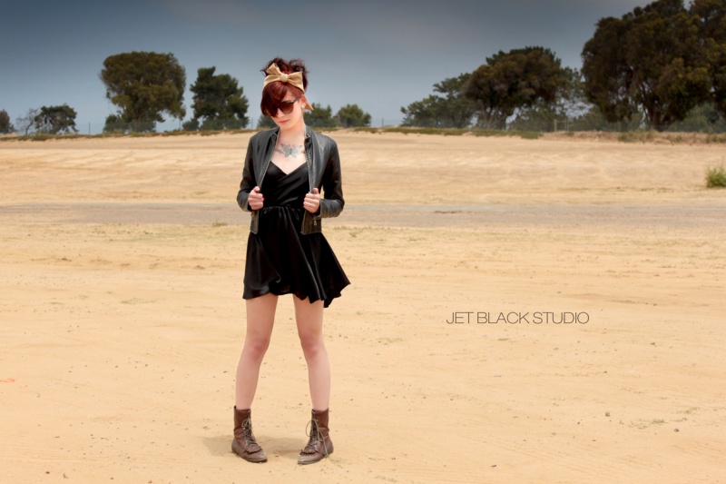 Female model photo shoot of Jet Black Studio, clothing designed by Cecilia Torres