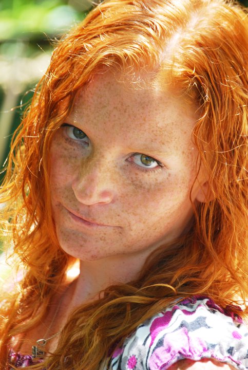 Female model photo shoot of Firie Red in Botanical Gardens