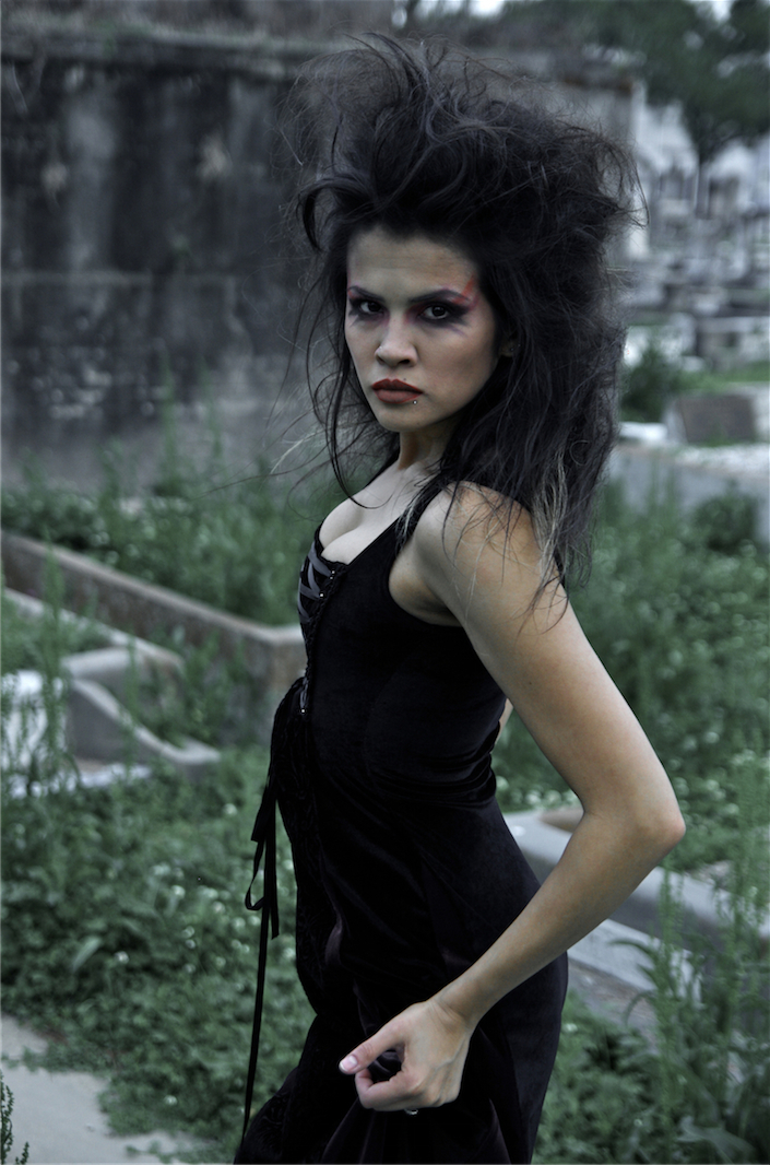 Female model photo shoot of Dorothy Miranda LP by JG Greene in New Orleans graveyard