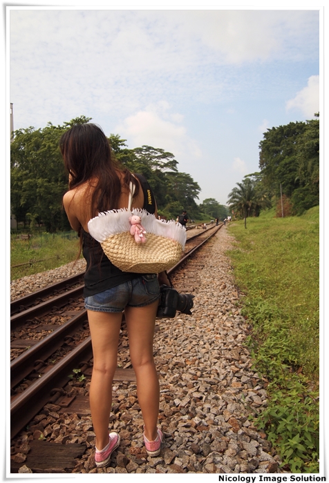 Female model photo shoot of Nicole Ooi in Bt.Timah Railway