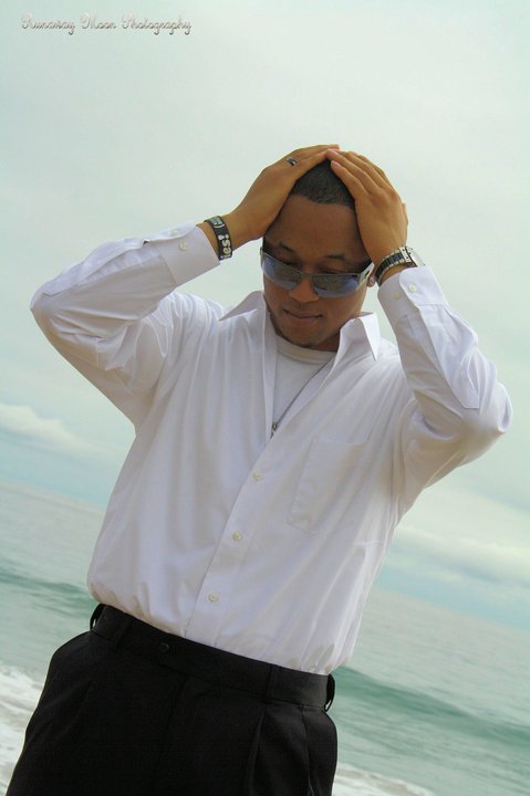Male model photo shoot of Isaiah23 in Zuma Beach