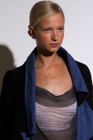 Female model photo shoot of Lindsey Jones Makeup in Fashion Week fall 2011
