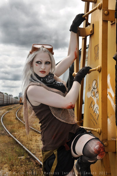 Female model photo shoot of Madness Inspiring Image in London Ontario