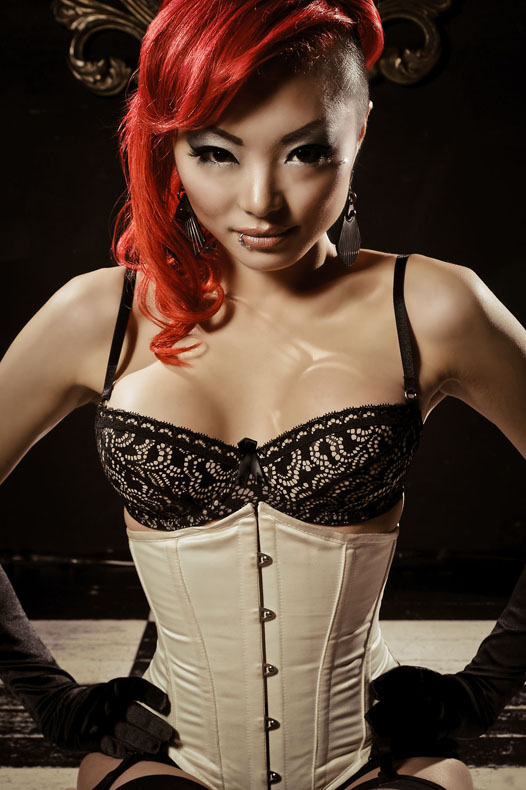 Female model photo shoot of sumi K by CON MILONAS PHOTOGRAPHY in Burlesque Bar
