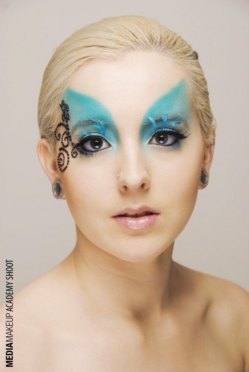 Female model photo shoot of Makeup by Sarah Jane