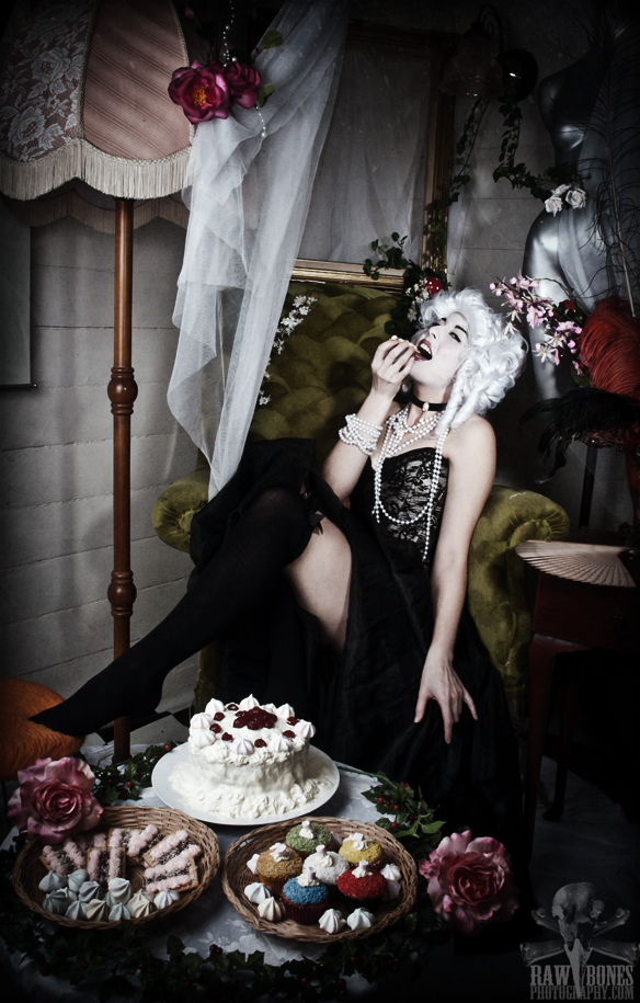 Female model photo shoot of Raw Bones Photography in Studio - snippet from the series - "Let them eat cake.."