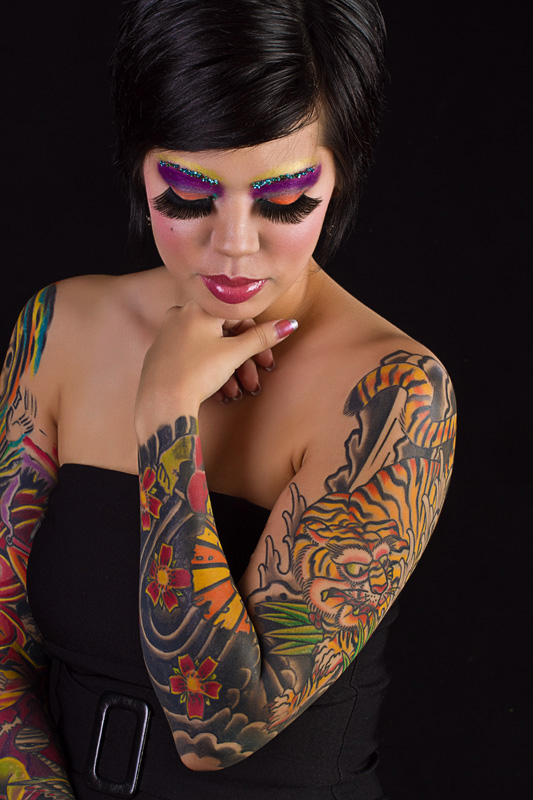 Female model photo shoot of Den Shi by EandJs Photography in TExas, makeup by susan ward-brooks