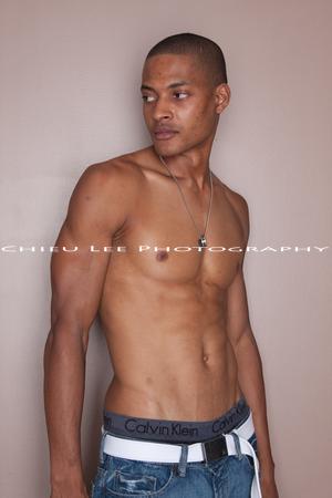 Male model photo shoot of Izhtaak Harrison
