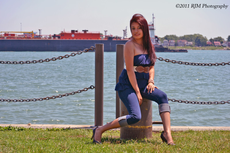 Female model photo shoot of Erika Aguirre by RJM_Photography in downtown Detroit