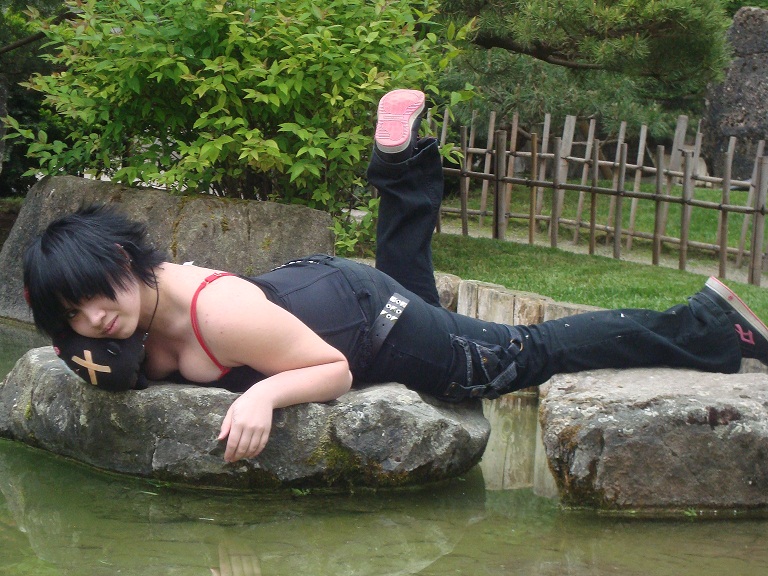 Female model photo shoot of Crimson Amara in Manito park