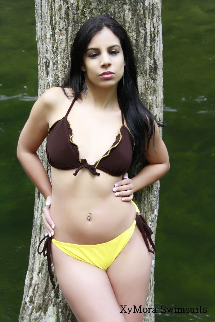 Female model photo shoot of XyMora Designs and LValeria by JayMora Photography
