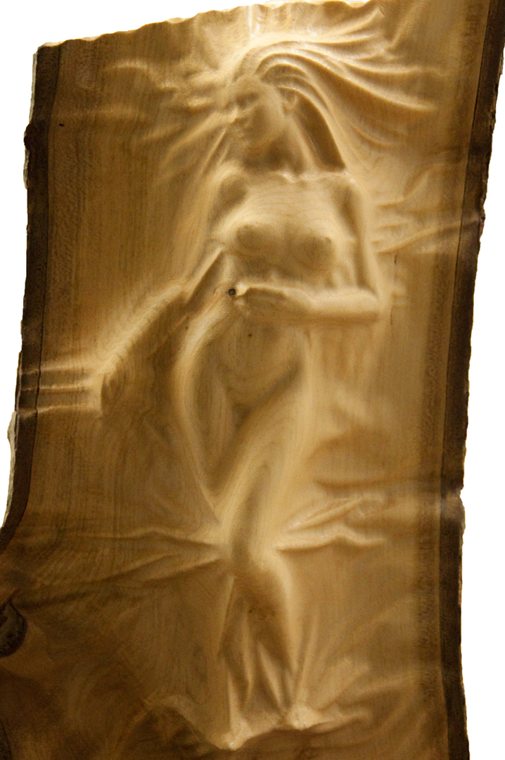 Male model photo shoot of woodsculpture