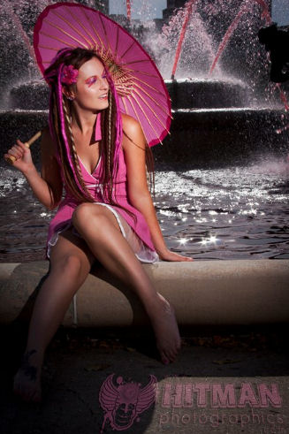 Female model photo shoot of Madilynn Paige in Country Club Plaza Fountain