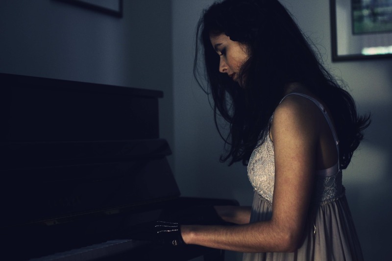 Female model photo shoot of Choc_Starfish in My piano room