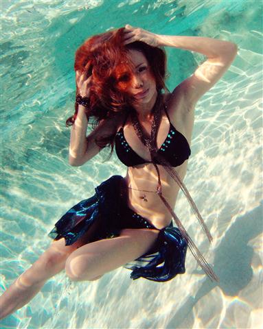 Female model photo shoot of claudetteTanPhotography and Trish Santos in Under water