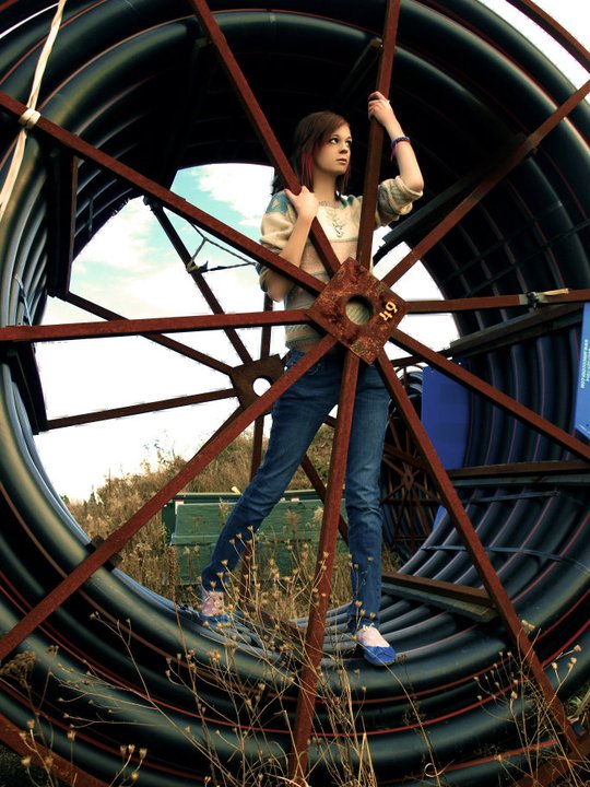 Female model photo shoot of Jenelope in In this big wheel