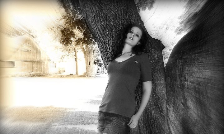 Female model photo shoot of BrandiN by kenny beverly in Tree