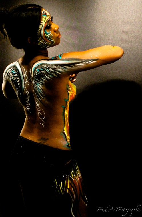 Female model photo shoot of Moneicia and Ijeoma in U of H art department studio, body painted by Christian Navarrete
